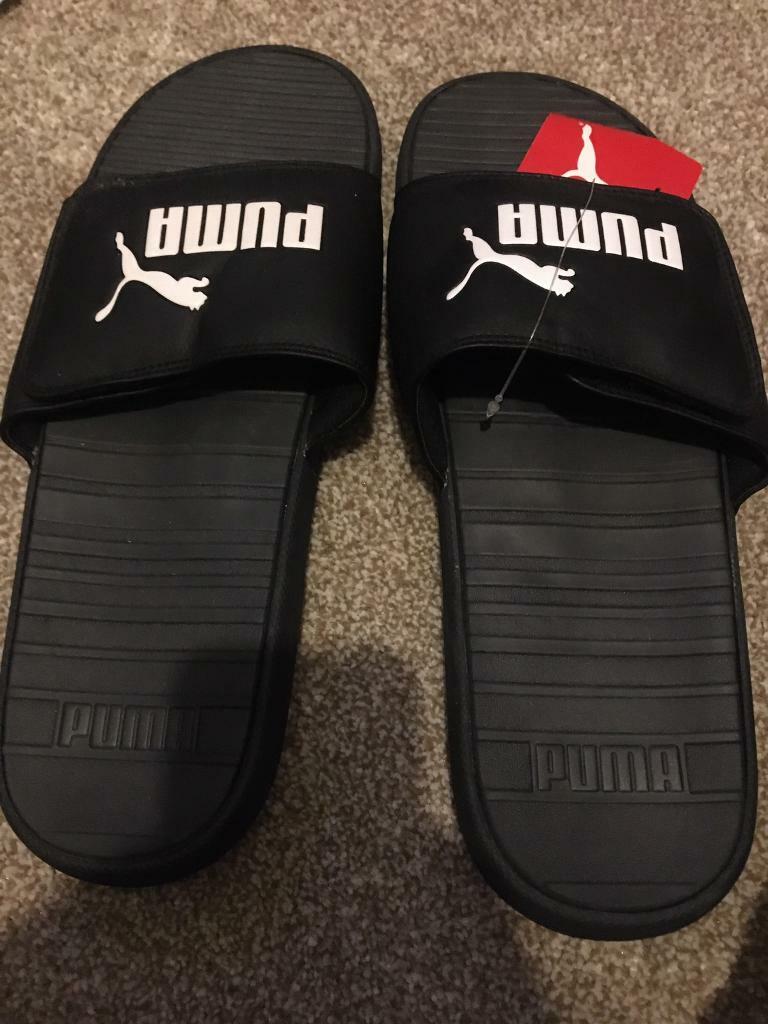 black puma sliders